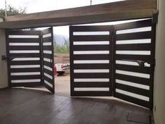 an open door with black and white stripes on it