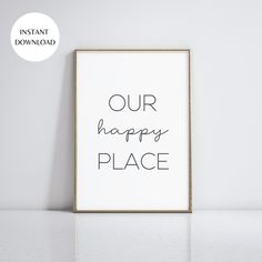 a black and white poster with the words our happy place in it on a wall