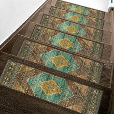 the steps are decorated with colorful rugs on them