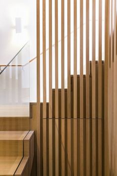 the interior of a building with wooden slats