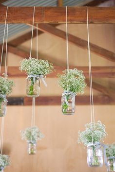 Loads of ideas for using Baby Breath flowers in a wedding setting - so gorgeous! Hanging Jars, Hanging Mason Jars, Wedding Decorations On A Budget, Rustic Wedding Decorations, Hanging Vases, Wedding Flower Decorations, Hanging Flowers