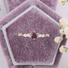 Simple & dainty 14k rose gold garnet engagement ring, Small tiny womens engagement ring,Garnet promise ring for her,Gold womens promise ring WE OFFER UNLIMITED PERIOD INSTALLMENTS PLAN This is a beautiful, stunning, feminine ring that works well for all occasions, styles, and ages. You will love it! Ring information: Main stone: Garnet Approximate size: 4.0mm Accent stones: Cubic zirconia Approximate size: 1.75mm (6 stones) Approximate weight of stones: 0.376ct ( in total) Approximate width Rose Gold Cz Ring, Small Engagement Rings, Garnet Engagement Ring, Promise Ring For Her, Fancy Gifts, Promise Rings For Her, Gem Ring, Garnet Rings, Rings For Her