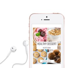 the healthy dessert recipe book is on an iphone with ear buds and headphones next to it