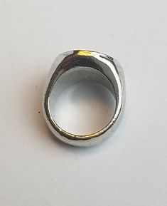 This signet ring is cast in lead-free pewter (Brittania alloy). The ring size when cast is 6. The sealing image is the Pagan equine goddess Epona. This is part of a series of signet rings I am making cast from lead-free pewter. Each ring is hand sculpted to give a unique, rustic style, relief image when used as a seal, with sealing wax. Symbolic Silver Metal Signet Ring, Symbolic Silver Signet Ring, Silver Engraved Metal Signet Ring, Vintage Hand Cast Round Signet Ring, Vintage Hand-cast Round Signet Ring, Vintage Engraved Metal Signet Ring, Goddess Epona, Pewter Ring, Resize Ring