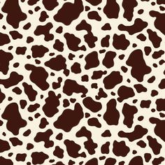 a brown and white animal print pattern with spots on the skin, which is very similar to