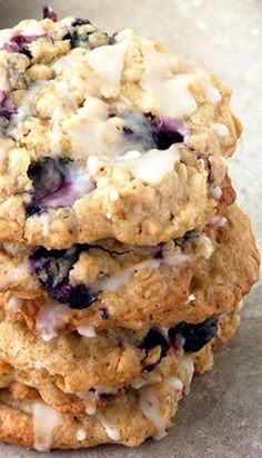 three blueberry cookies stacked on top of each other