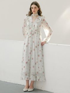 Calf-length, floral chiffon dress. V-shaped neckline, flounce-trimmed, fitted bodice and gently flared skirt. Long balloon sleeves with narrow elastic at cuffs and a lace scarf. Partly lined. - Midi- V-neck- Long sleeves Spring Chiffon Maxi Dress With Lace Trim, Elegant Chiffon Dress With Ruffle Hem For Garden Party, Feminine Spring Chiffon Dress With Ruffle Hem, Spring Long Sleeve Midi Dress With Lace Collar, Feminine Chiffon Dress With Ruffle Hem For Spring, Feminine Floral Print Chiffon Dress, Feminine Ruffle Hem Chiffon Dress For Spring, Feminine Chiffon Maxi Dress, Spring Chiffon Dresses With Lace Trim