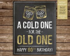 a chalkboard sign that says, a cold one for the old one happy 50th birthday