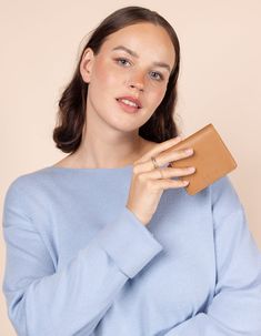 Introducing our best selling Alex Fold-Over Wallet in Vegan Uppeal™! This vegan alternative looks, feels and behaves like traditional leather with the same durability - impressive, right? Our Alex Fold-Over Wallet in Vegan Uppeal™ has the same sleek and minimalist design as our classic Alex. Whether you’re actively into accessories or not, a wallet is the one thing everyone needs to have. And it’s worth getting a good one, too! Your wallet should be able to hold all of the most important things Versatile Brown Card Holder With Rfid Blocking, Versatile Brown Wallet With Rfid Blocking, Cognac Card Holder With Rfid Blocking For Everyday Use, Cognac Rfid Blocking Card Holder For Everyday Use, Versatile Brown Card Holder For Everyday Use, Cognac Wallets With Rfid Blocking, Cognac Wallet With Rfid Blocking For Everyday, Cognac Rfid Blocking Wallet For Everyday, Versatile Brown Wallet For Gift