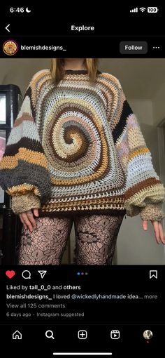 a woman in tights is wearing a multicolored crochet knit sweater