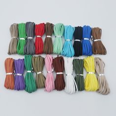 various colors of waxe cord on white background