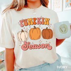 thanksgiving pumpkin season shirt, thanksgiving shirts, fall shirts, thankful shirts, thanksgiving tshirts, happy thanksgiving shirt, family thanksgiving shirt COMFORT COLORS - ADULT UNISEX - (1717, 6014) 6.1 oz./yd² (US), 10 oz/L yd (CA), 100% ring spun cotton, 20 singles Garment dyed for that lived in feel and almost no shrinkage at home. Soft ring spun cotton fabric with 100% cotton threads Relaxed fit Topstitched, classic width, collar Twill taped neck and shoulders for comfort and durability Rib cuffs Shoulder to shoulder twill tape Signature twill label Made With Respect Proud member of the U.S. Cotton Trust Protocol Made with OEKO-TEX certified low-impact dyes Our clean pigment dye colors are salt free This product meets the following Sustainable Style subcategories: Sustainable Man Tha Ksgiving Shirts, Thanksgiving Tshirts, Thanksgiving Cotton T-shirt With Crew Neck, Casual Thanksgiving T-shirt With Graphic Print, Thanksgiving Cotton Graphic Print T-shirt, Thanksgiving Tee, Thankful Shirt, Family Thanksgiving, Pumpkin Seasoning