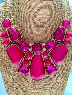 Details: This Geometric Puzzle Necklace features energy that comes from bright, saturated colors. In this case fuschia pink acetate pieces that form an elaborate puzzle, all outlined in gold plate. It's a statement necklace sure to grab attention! This is a design interpreted in a modern way, with an almost tribal feel. Perfect for this season, it's classic with any solid-color top or dress, when you want to be the center of the event! FREE SHIPPING WITH TRACKING  So your jewelry budget isn't eaten up by postage :) All pieces are presented in a lovely organza gift bag. Necklace length: 15" inside, 21"outside measure  Extender: 3" (or 18"-24" with the extender) The  2" coordinating dangling Geometric Puzzle Earrings are sold separately and can be ordered here: https://www.etsy.com/your/shop Trendy Pink Resin Jewelry, Trendy Resin Necklaces For Party, Bold Pink Jewelry For Gifts, Pink Resin Party Necklaces, Vibrant Pink Jewelry For Party, Rose Red Party Necklace, Puzzle Earrings, Geometric Puzzle, Puzzle Necklace