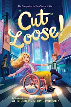 the poster for cut loose with two people on a wheel chair in front of a city street