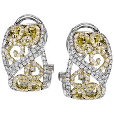 Simon G. 18K Yellow and White Gold Two-Tone Diamond Filigree Huggie Earrings Featuring 0.91 Carats Round Cut White Diamonds with an Omega Clasp Delivery takes 3 weeks for Simon G. to create and will ship immediately after completion. Rush delivery available depending on style and upon request Earrings measure approximately 1/2 inch long x 1/4 inch wide Diamonds are VS2 clarity and G/H color Also available in 18K rose and white gold Includes earring box and jewelry appraisal Ships fully insured t Paisley Jewelry, Clasp Earrings, Bold Rings, Earring Box, Jewelry Appraisal, Tax Free, Huggie Earrings, White Diamonds, White Metal