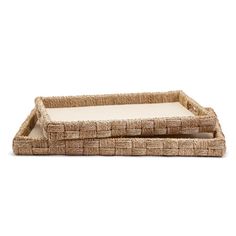 two rectangular wicker trays with white cushions on each side, one in the shape of a rectangle