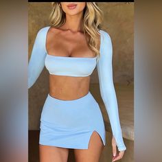 Prepare To Mesmerise In The Zima Mini, A Skort With A Slip On Design And Small Split To One Side. Made In Our Signature Custom Mesh That's Soft And Stretchy, Style With The Matching Lucianna Crop Top And Make Sure All Eyes Are On You. Colour: Baby Blue. Double Layered. Slip On Design. High Waisted. Small Split. Mini Length. Blue Long Sleeve Crop Top For Night Out, Blue Fitted Long Sleeve Crop Top, Light Blue Fitted Long Sleeve Crop Top, Fitted Long Sleeve Blue Crop Top, Fitted Light Blue Long Sleeve Crop Top, Fitted Long Sleeve Light Blue Crop Top, Blue Mini Skirt Outfit, Brown Tennis Skirt, Blue Tennis Skirt