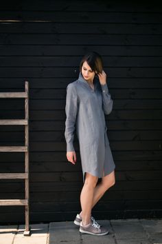 Modern, long sleeves linen shirt dress with asymmetrical length and cute stylish details. It is sewn from high quality LITHUANIAN softened linen. It is light and comfy, perfect for spring / summer seasons. You can wear it as a dress or as a tunic together with jeans, pants, leggings. This exceptional design shirt dress has hidden buttons in the front, thus this shirt dress looks like some light jacket. Some noticeable details like pockets and collar make this shirt dress unique piece of clothing Fitted Long Sleeve Dress With Placket, Fitted Spring Shirt Dress, Fitted Collar Shirt Dress For Spring, Spring Collared Tunic For Workwear, Fitted Linen Long Sleeve Shirt Dress, Spring Workwear Collared Tunic, Fitted Long Sleeve Linen Shirt Dress, Long Sleeve Linen Dress With Placket, Spring Workwear Fitted Tunic