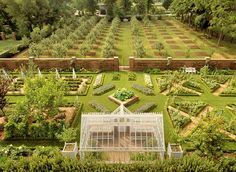 an aerial view of a garden with lots of trees