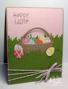 a handmade easter card with an egg in a basket