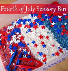 an american flag made out of red, white and blue sprinkles with scissors