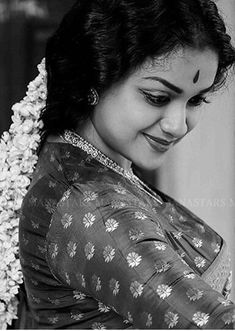 black and white photograph of a woman in sari