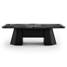 a black table sitting on top of a white floor