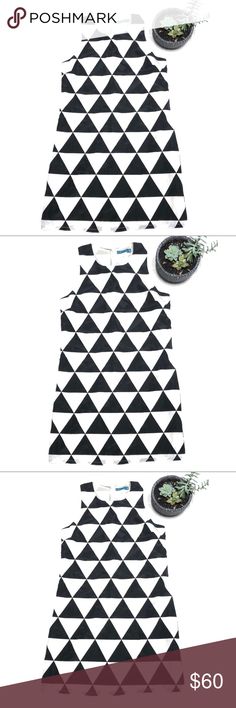 NWT Pim & Larkin Black &White Triangle Retro Dress NWT Size XS Pim & Larkin  Cool black & White  Triangle design  Retro style Pim + Larkin Dresses Mini Black Sleeveless Dress With Geometric Pattern, Black Geometric Pattern Sleeveless Dress, Triangle Design, Retro Dress, Retro Style, Dresses Mini, Retro Fashion, Black White, Dresses Skirts