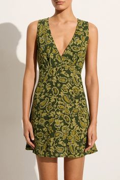 The Nadja Mini Dress in Rosella Floral is a summer dressing staple, featuring a sleeveless silhouette with a deep v-neckline, back waist ties for a custom fit and a relaxed, easy-wearing mini skirt. Crafted from responsibly sourced rayon crepe and hand-printed with a green paisley motif throughout. Short Tie, Summer Dressing, Paisley Motif, Tie Back Dress, Green Paisley, Paisley Print Dress, Maxi Dress Sale, Faithfull The Brand, Paisley Dress