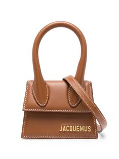 mini Le Chiquito tote bag from Jacquemus featuring brown, calf leather, adjustable detachable shoulder strap, single top handle, foldover top with magnetic fastening, gold-tone logo plaque and main compartment. Jacquemus Le Chiquito, Jacquemus Bag, Micro Bag, Mini Tote Bag, Bag Light, Brown Bags, Mini Tote, Leather Mini, Flip Flop