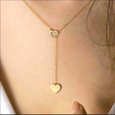 Gold B-Neck And Lariat Necklace. Super Cute,Length Is 25.2. Double Heart Necklace For Party, Heart Necklace With Adjustable Chain For Party, Elegant Long Necklace With Heart Charm, Adjustable Chain Heart Necklace For Party, Chic Necklace With Adjustable Length For Gift, Adjustable Lariat Necklaces For Valentine's Day, Valentine's Day Heart Pendant Lariat Necklace, Dangle Charm Necklaces For Her, Adjustable Lariat Necklace With Heart Charm