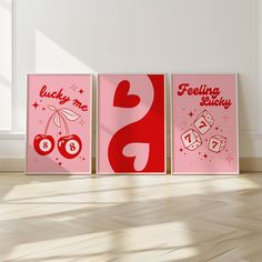 three posters with the words lucky me, feeling lucky and cherries in red on them