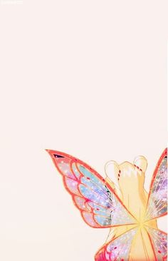 a colorful butterfly is flying in the sky