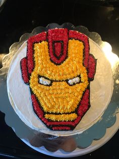 a cake that looks like iron man is on a plate