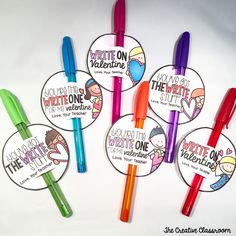 four colorful pens with writing on them are in the shape of stickers for valentine's day