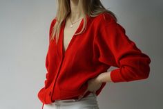 Bright and Bold red cardigan sweater. A closet staple, especially one in this classic red color! Size: umarked model is a size Small / 4 Measurements: Shoulder: 18 1/4" Bust: 38" Hip: 28" Length: 27" Sleeve: 22" Material: Unknown Condition: Gently used, see photos of stain and some pilling Measurements are taken with the garment lying flat, from seam to seam, and doubled where appropriate. If you need any additional measurements, pictures, or have any questions please don't hesitate to ask! Visi Japanese 80s, Red Cardigan Sweater, Sweater With Pockets, Red Cardigan, Red Button, Button Cardigan, Sleeve Sweater, Cardigans For Women, Cardigan Sweater