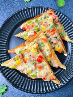 three quesadillas on a plate with text overlay that reads vegan chili cheese toast