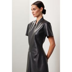 Black faux leather (100% Polyurethane) Midi dress. V-Neckline. Short Sleeves. Back zipper closure. 40" shoulder to hemline. Imported. Sleek Knee-length Faux Leather Dress, Sleek Leather Dresses For Workwear, Sleek Leather Workwear Dress, Sleek Leather Dress For Work, Knee-length Leather Mini Dress For Formal Occasions, Formal Knee-length Leather Mini Dress, Leather Midi Dress, Rent The Runway, Closet Designs