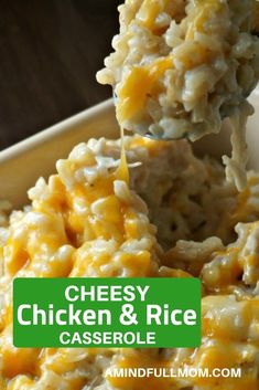 cheesy chicken and rice casserole is being held up by a spoon