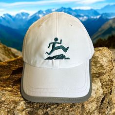 Whether you're hitting the trails, going for a jog around the neighborhood, or simply enjoying the great outdoors, our Lightweight Reflective Running Hat offers the perfect blend of functionality and style. The breathable fabric and moisture-wicking properties keep you cool and dry, while the reflective brim enhances your safety. Plus, the embroidered trail runner graphic adds a unique and personal touch to your running attire. Key Features: * Embroidered Trail Runner Graphic: Featuring a unique White Lightweight Trucker Hat For Outdoor, White Lightweight Baseball Cap For Outdoor, Lightweight White Baseball Cap For Outdoor, Outdoor Baseball Cap With Curved Brim And Moisture-wicking, Lightweight White Outdoor Hat, White Hat With Upf 50+ For Outdoor Activities, White Breathable Trucker Hat For Outdoor, Outdoor Breathable Hat With Curved Bill, Lightweight White Hat For Outdoor Activities