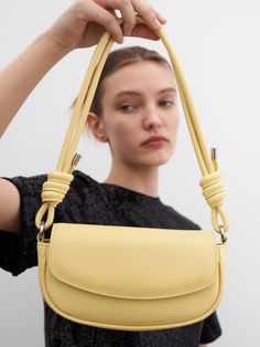 Editor's NotesThe elegant and classic bag from MUNIER is designed to match any look according to your mood.- Cute round silhouette- Strap with knot detailed flap bag- Easy to open and close with magnet closure- Practical with outer and inner pocketsMeasurements(in.)One size- Size: 9.06 in. (W) * 4.92 in. (H) * 1.97 in. (D)- Handle Drop: 9.84 in.Composition & Care- Upper: Artificial Leather  Lining: 100% Cotton- Avoid direct heat and moisture- The leather may have fine scratches and wrin Chic Bags With Loop Closure For Daily Use, Chic Shoulder Bag With Loop Closure For Daily Use, Chic Shoulder Bag With Loop Closure, Elegant Daily Use Bag With Loop Closure, Elegant Shoulder Bag With Loop Closure For Daily Use, Elegant Evening Bags With Loop Closure, Elegant Evening Bag With Loop Closure, Classic Bags, W Concept