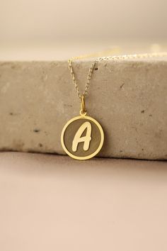 Gold Initial Pendant - Initial Gold Necklace ● Material of pendant: Solid Gold 14k ( REAL GOLD ) ● Metal Stamp: 14k ( REAL GOLD ) ● The pendant is available in 5 sizes: - 12,7 mm / 0.5 inches (Diameter) - 14,0 mm / 0,55 inches ( Diameter ) In the photos - 15,3 mm / 0.6 inches ( Diameter ) - 16,5 mm / 0,65 inches ( Diameter ) - 19,1 mm / 0,75 inches ( Diameter ) ( In the photos the size is 14mm / 0.55 inches Diameter ) ( Jump Ring inner diameter: 4 mm ) ● Material of chain: Solid gold 14k ( REAL GOLD ) It is thin and dainty and it is available in 4 sizes: - 40 cm / 15,75 inches ( Length ) - 45 cm / 17,72 inches ( Length ) In the photos - 50 cm / 19,68 inches ( Length ) - 55 cm / 21,65 inches ( Length ) ● Backside engraving is FREE ( Please use the personalization box for that.) ● If you wan Yellow Gold Initial Pendant Charm Necklace Stamped 14k, Personalized Yellow Gold Charm Pendant Necklace, Personalized Yellow Gold Pendant Charm Necklace, Hallmarked Round Yellow Gold Initial Necklace, Hallmarked Yellow Gold Round Initial Necklace, Custom Yellow Gold Necklace With Initial Pendant, Yellow Gold Initial Pendant Charm Necklace 14k Stamped, Yellow Gold Initial Pendant Charm Necklace 14k, Gold Custom Initial Pendant Necklace Hallmarked