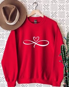 Infinity Love Sweatshirt, Forever Love Sweatshirt, Love Sweater, Valentines Day Crewneck Sweater, Birthday Gift, Gift for Love,Heart Sweater WELCOME TO "StyleDesignUS" High quality and super soft, comfortable Sweatshirt and Hoodies. Made with top of the line vinyl and pressed with a professional grade heat press. SIZING AND COLORS Make sure you check our size-chart before you place your order. If you are not sure about sizing please measure your favorite Sweatshirt or Hoodie and compare measurem Love Sweater, Love Sweatshirt, Gift For Love, Couples Sweatshirts, Infinity Love, Valentines Design, Heart Sweater, Custom Sweatshirts, Forever Love