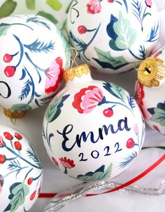 christmas ornaments with names painted on them