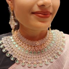 About the Jewellery Pastel Green Colour American Diamonds Choker Necklace Set By Asp Fashion Jewellery Complete your beautiful looks with this pastel green Color Choker Necklace set and get an overall gorgeous appearance. Wear it on special occasions and everyone with your looks. This necklace set is a perfect combination of traditional & contemporary design. Suitable for all Kinds of Dressy Occasions. . Make your moment memorable with this range. This jewel set features a unique one of a kind t Elegant Turquoise Wedding Sets, Elegant Light Green Wedding Sets, Elegant Green Gift Sets, Elegant Light Green Sets, Diamonds Choker, Radha Beauty, Diamond Choker Necklace, Traditional Contemporary, Diamond Choker