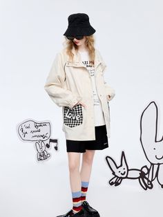 Details: Long sleeve nylon coach jacket in off-white Snap button front closure Black & white checkered flat front pockets 'Love' embroidered on front pockets Monochromatic U-bunny embroidered on front chest Materials & Care: 100% Polyester Hand wash | Dry clean Do not bleach Size & Fit: Model is 5'7", Bust 32, Waist 24, Hips 35, wearing a size S Item #: LM1OW02 Trendy Streetwear Outerwear With Patch Pockets, Trendy Outerwear With Patch Pockets For Streetwear, Casual Spring Outerwear With Patchwork, Spring Streetwear Outerwear With Patch Pockets, Urban Patchwork Outerwear For Spring, Urban Outerwear With Patch Pockets, Casual White Outerwear With Patch Pockets, Trendy Spring Outerwear With Side Pockets, Casual Spring Outerwear With Patch Pockets