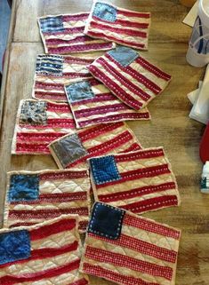 american flag quilts laid out on a table