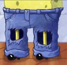 two blue pants with yellow handles are standing in front of a spongebob wall