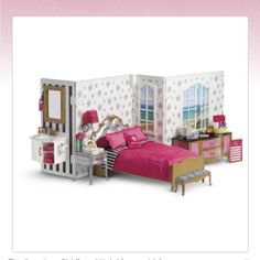 a dollhouse bedroom is shown with furniture and accessories in pink, white and gold colors