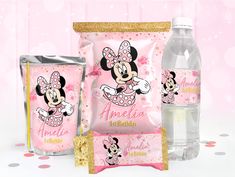 a pink and gold minnie mouse birthday party package with water bottle, candy bar wrapper, and cupcakes